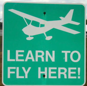 Read more about the article The Benefits of Attending Flight College vs. Flight School